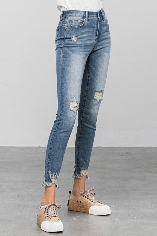 HIGH STRETCH MID RISE SKINNY JEANS